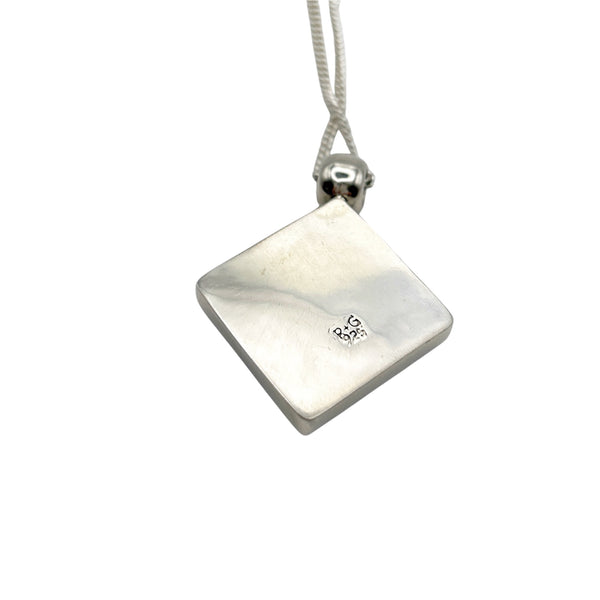 Beautiful pendant in blue and silver dichroic glass.