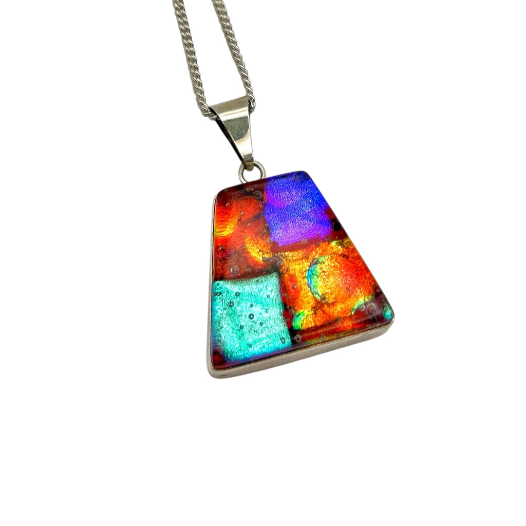 Beautiful orange and purple dichroic glass pendant