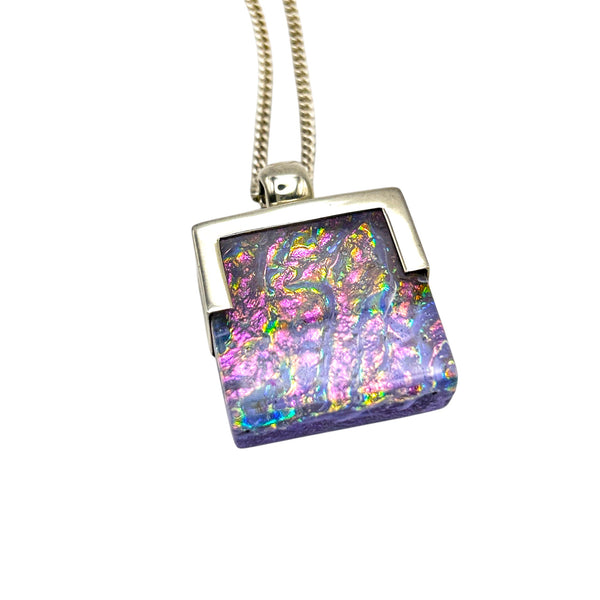 Beautiful pale pink dichroic glass pendant