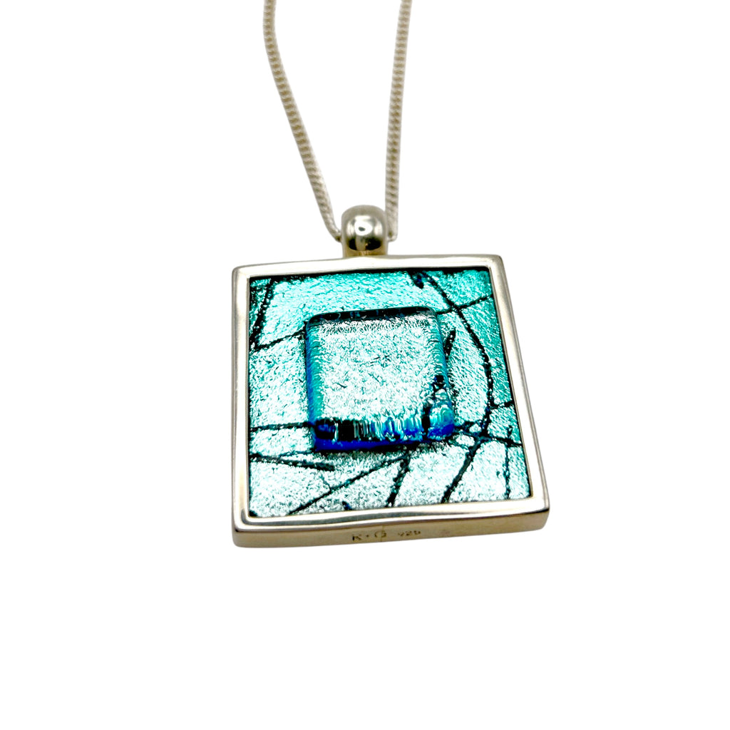 Striking turquoise dichroic glass pendant
