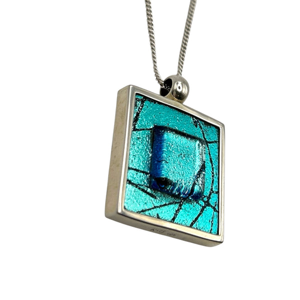 Striking turquoise dichroic glass pendant